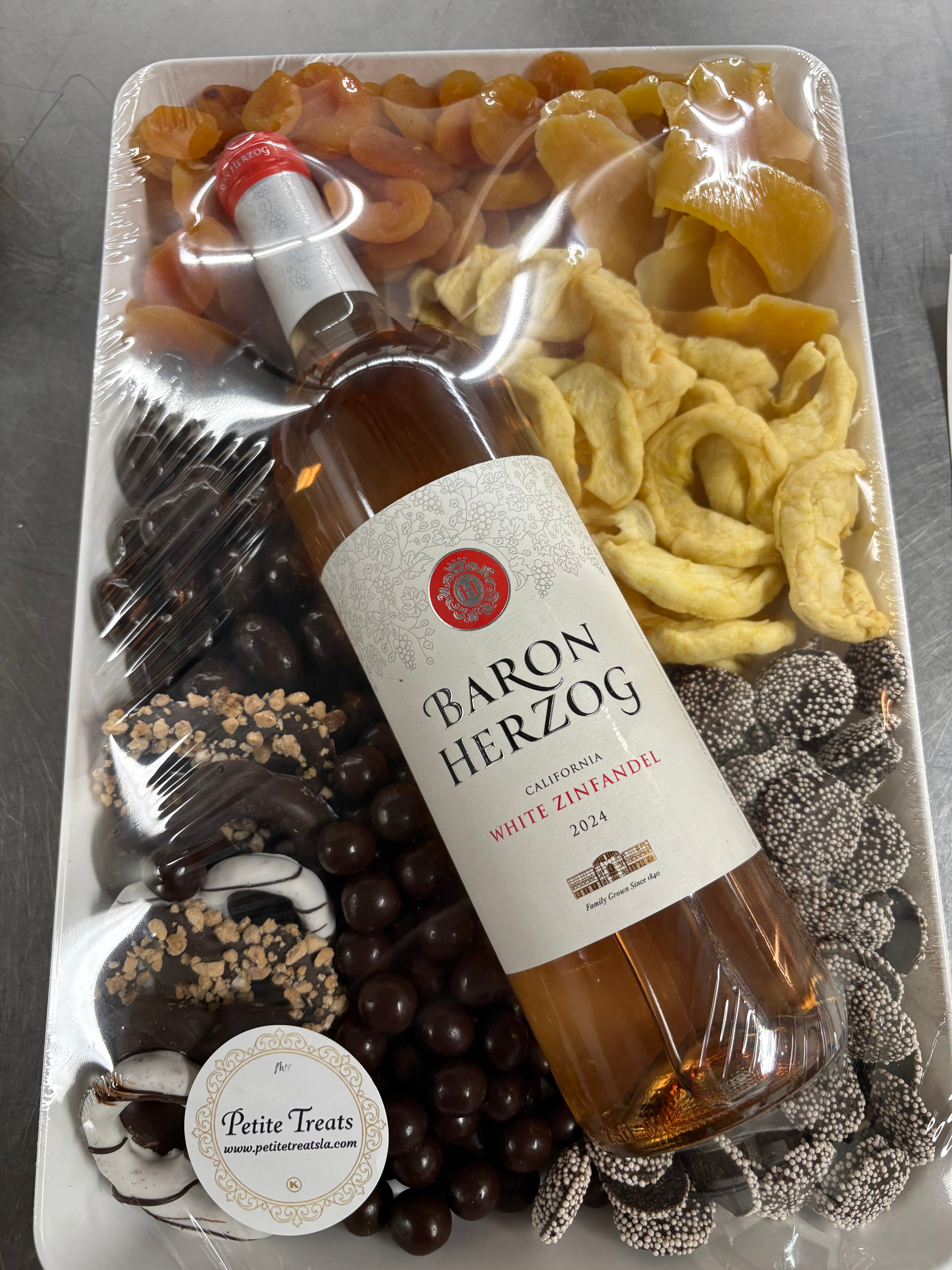 Rectangular tray with wine and confections